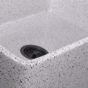 Nantucket Sinks FCFS3020S-PietraSarda close-up of the black and grey speckled Pietra Sarda glaze at the bowl corner