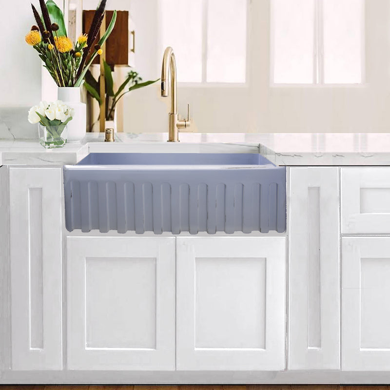 Nantucket Sinks FCFS3020S-ShabbySugar Shabby Sugar farmhouse sink showing the fluted apron in white cabinets