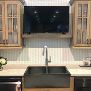 Nantucket Sinks FCFS3318D-Concrete Concrete double bowl farmhouse sink in a wood cabinet kitchen with herringbone tile