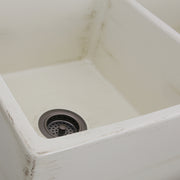 Nantucket Sinks FCFS3318D-ShabbyStraw close-up of the distressed Shabby Straw glaze in the bowl corner by the drain