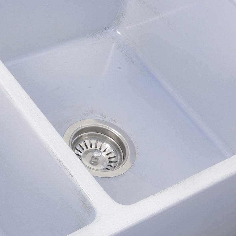 Nantucket Sinks FCFS3318D-ShabbySugar close-up of the Shabby Sugar blue glaze at the bowl divider and drain
