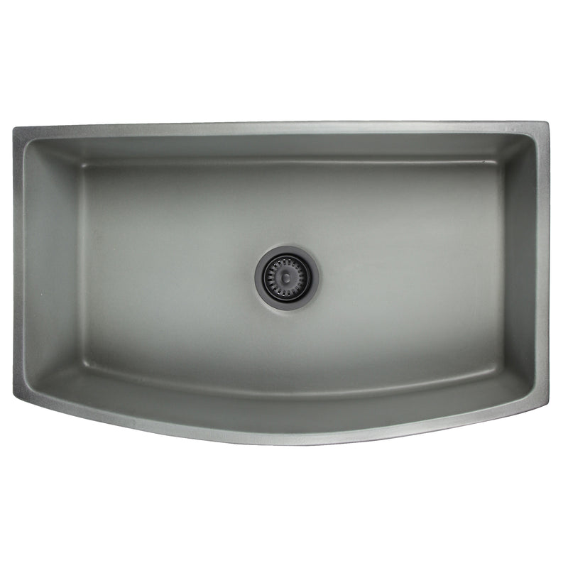 Nantucket Sinks FCFS3320CA-C Concrete curved apron farmhouse sink from above showing the bowl and drain