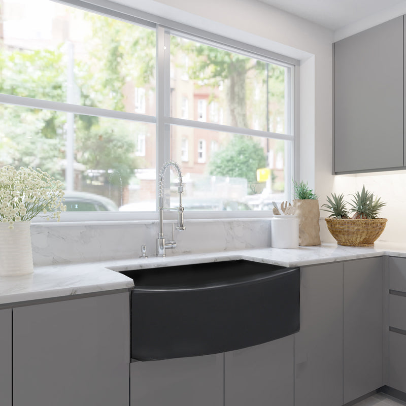 Nantucket Sinks FCFS3320CA-MB Matte Black curved apron farmhouse sink in grey cabinets under a big window
