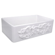 Nantucket Sinks FCFS3320S-Grapes white fireclay farmhouse sink, three-quarter view of the carved Grapes apron