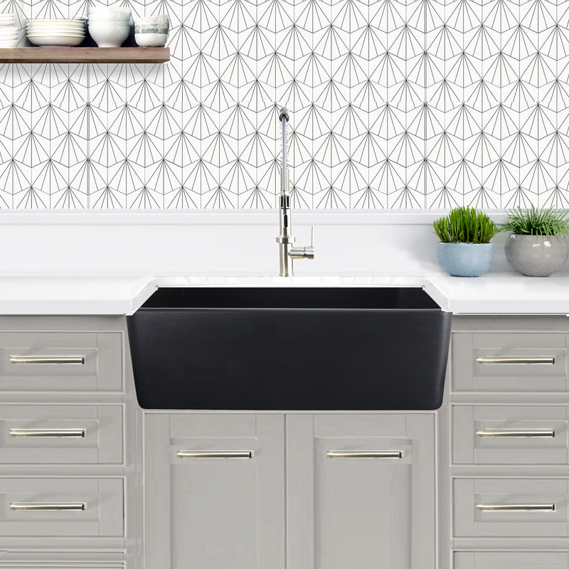 Nantucket Sinks FCFS3320S-MatteBlack Matte Black farmhouse sink with flat apron in grey cabinets under patterned tile