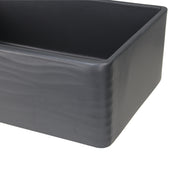 Nantucket Sinks FCFS3320S-MB-Waves close-up of the wave ripples on the matte black apron corner