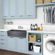 Nantucket Sinks FCFS3320S-MB-Waves Matte Black Waves farmhouse sink in a light blue laundry room