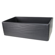 Nantucket Sinks FCFS3320S-MB-Waves Matte Black fireclay farmhouse sink, three-quarter view of the rippled Waves apron