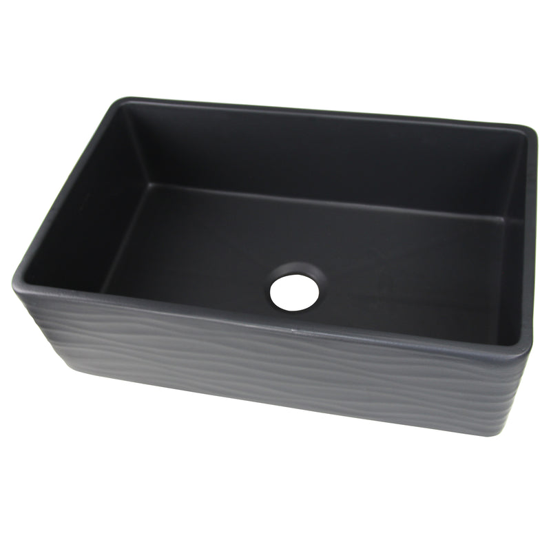 Nantucket Sinks FCFS3320S-MB-Waves Matte Black Waves farmhouse sink from above at an angle, drain opening