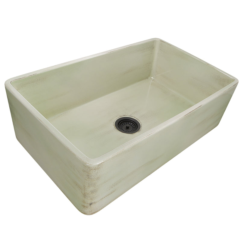 Nantucket Sinks FCFS3320S-ShabbyGreen distressed Shabby Green fireclay farmhouse sink, three-quarter view of the flat apron