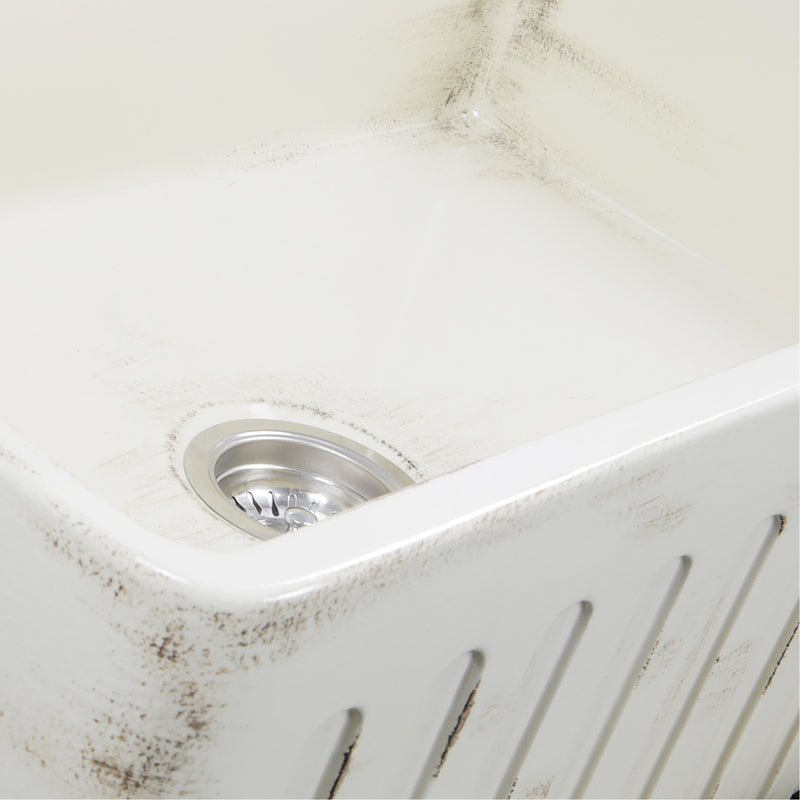 Nantucket Sinks FCFS3320S-ShabbyStraw close-up of the distressed Shabby Straw glaze and fluted apron edge