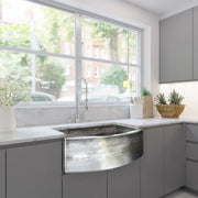 Nantucket Sinks FSSH3322 installed in a gray kitchen beneath a large window