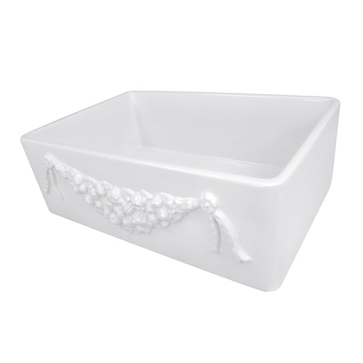 Nantucket Sinks Garland-30W white fireclay farmhouse sink, three-quarter view of the raised floral Garland apron