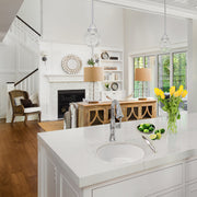 Nantucket Sinks Hyannis-18 round bar sink in a white marble island in a bright living kitchen