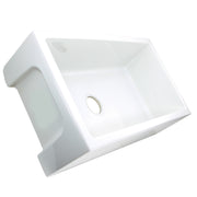Nantucket Sinks ISFCW33x18SO farmhouse sink tilted to show the side cut-out and bowl with drain hole