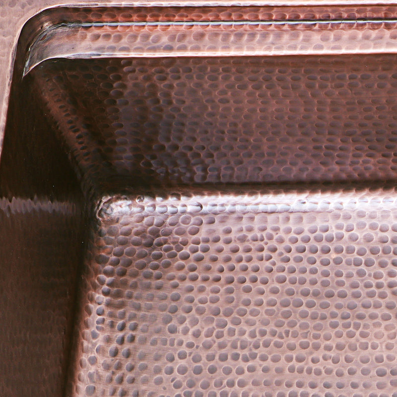 Nantucket Sinks KCH-PS-3220 close-up of the hand-hammered copper ledge and bowl corner