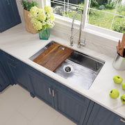 Nantucket Sinks KSSH-PS-3220 installed in a white counter over blue cabinets with the board