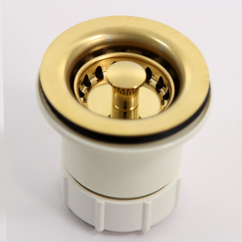 Nantucket Sinks NS-403PB polished brass junior duo drain with strainer seated, light gray background