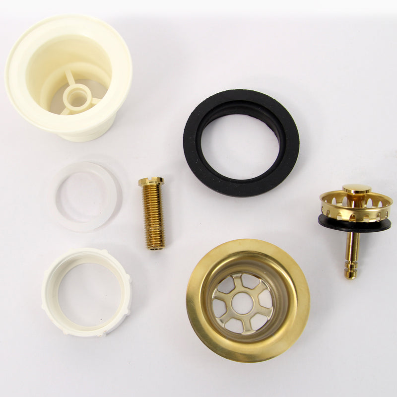 Nantucket Sinks NS-403ULB junior duo drain parts laid out: brass flange, strainer, gasket, body and nut