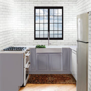 Nantucket Sinks NS-GSEZA32S white EZApron farmhouse sink in a lavender-cabinet kitchen under a black window