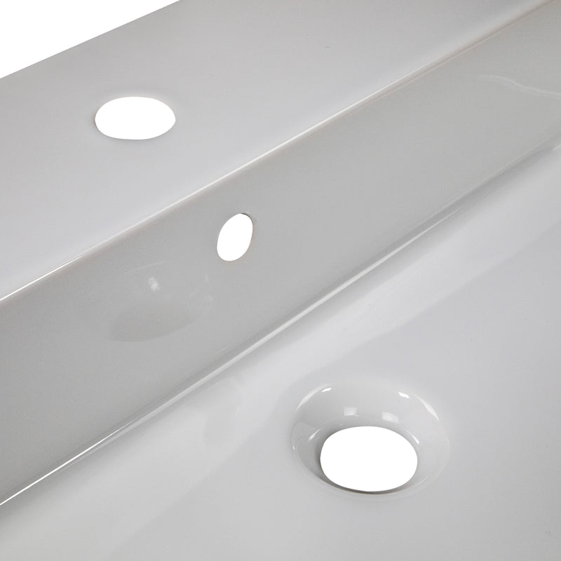 Nantucket Sinks NS-NPCS28W close-up of the glossy white glaze around the overflow and drain openings