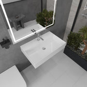 Nantucket Sinks NS-NPCS28W 28" wall-mount sink from above with a chrome faucet in a grey bathroom
