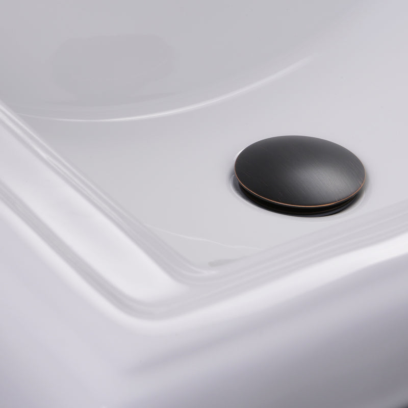 Nantucket Sinks NS-UD-BRORB brushed oil-rubbed bronze umbrella cap seated in a white sink basin