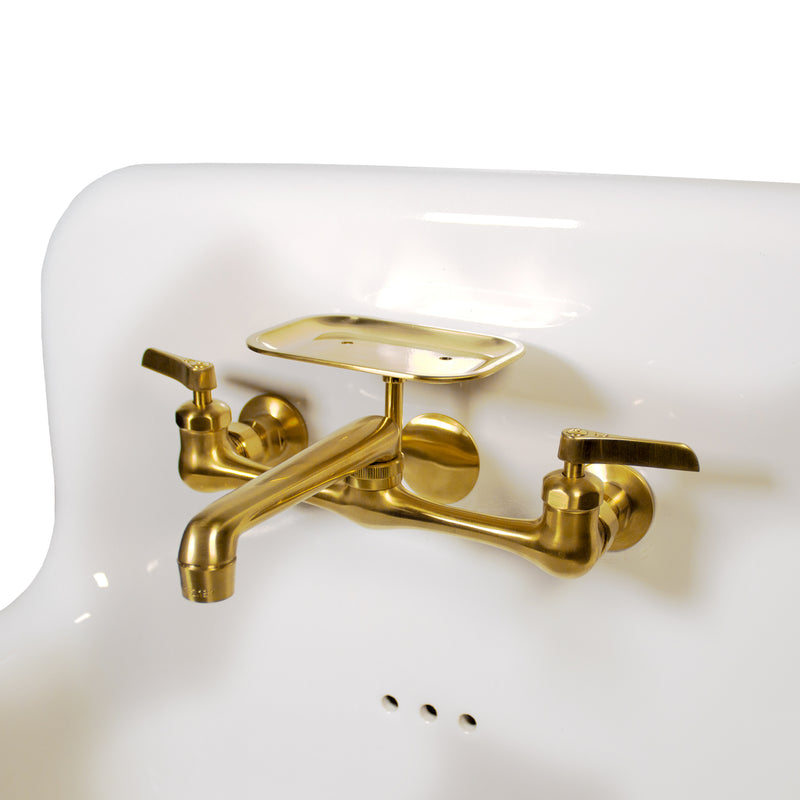 Nantucket Sinks NS-VC16-WW-SBFCT close-up of the satin brushed brass two-handle faucet and soap dish