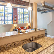 Nantucket Sinks NS03i-16 installed in a granite island in a loft kitchen