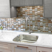Nantucket Sinks NS09i-16 installed in white marble below a mosaic tile backsplash