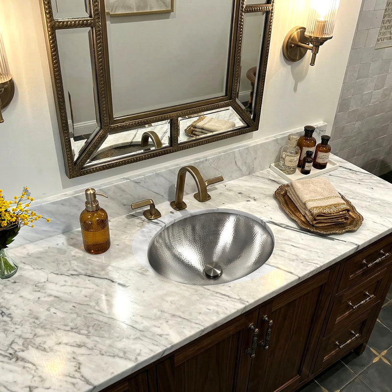 Nantucket Sinks OVS2017 installed in a marble vanity under a framed mirror