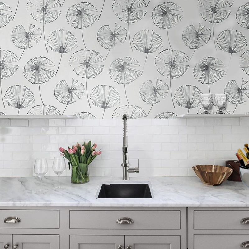 Nantucket Sinks PR1716-BL black bar sink in a marble counter on a gray kitchen island