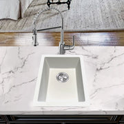 Nantucket Sinks PR1815-W white bar sink undermounted in a white marble counter with a pull-down faucet