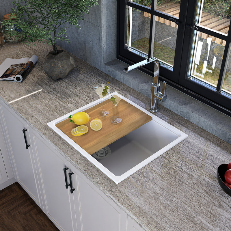 Nantucket Sinks PR2219PS-W white workstation sink in a stone counter with the cutting board on the ledge