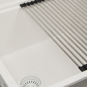 Nantucket Sinks PR2219PS-W close-up of the roll-up mat on the ledge above the white basket strainer