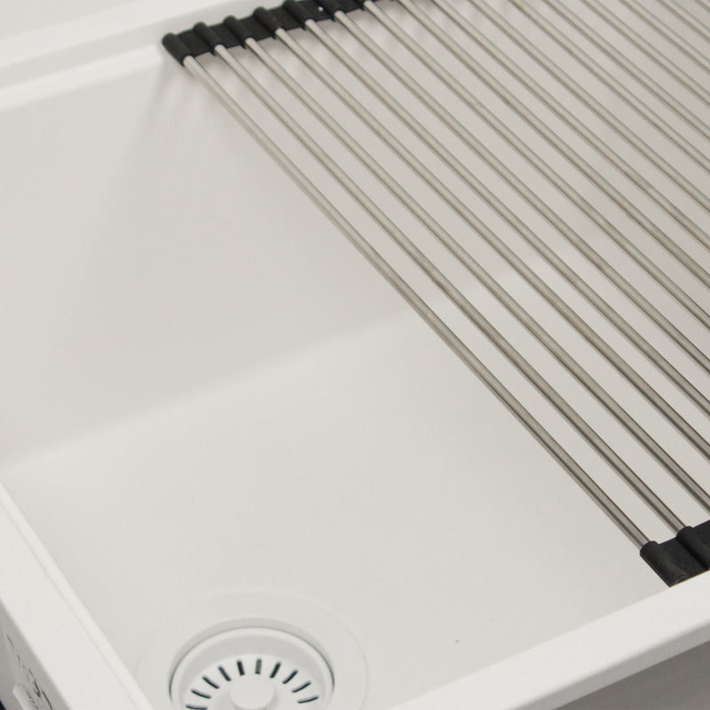 Nantucket Sinks PR2219PS-W close-up of the roll-up mat on the ledge above the white basket strainer