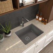 Nantucket Sinks PR2522-DM-TI titanium laundry sink undermounted in a quartz counter