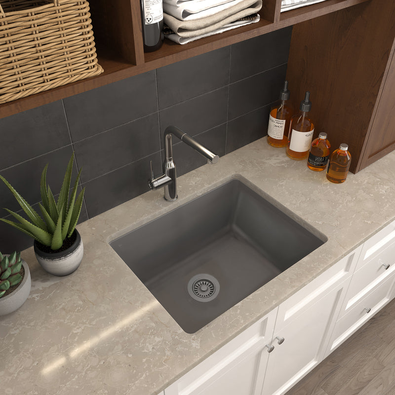 Nantucket Sinks PR2522-DM-TI titanium laundry sink undermounted in a quartz counter