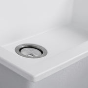 Nantucket Sinks PR2720-DM-W close-up of the stainless drain and white granite bowl floor