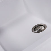 Nantucket Sinks PR3018-W close-up of the stainless drain and white granite bowl floor