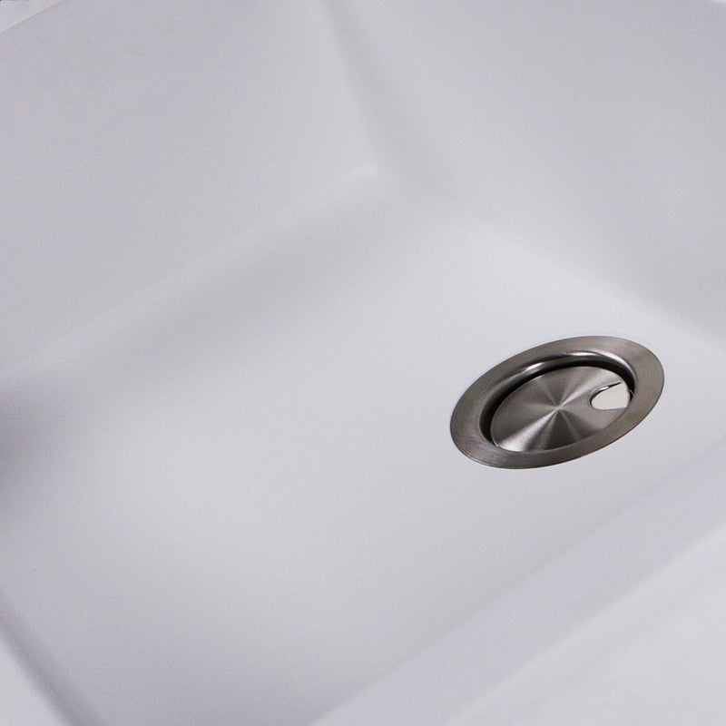Nantucket Sinks PR3018-W close-up of the stainless drain and white granite bowl floor