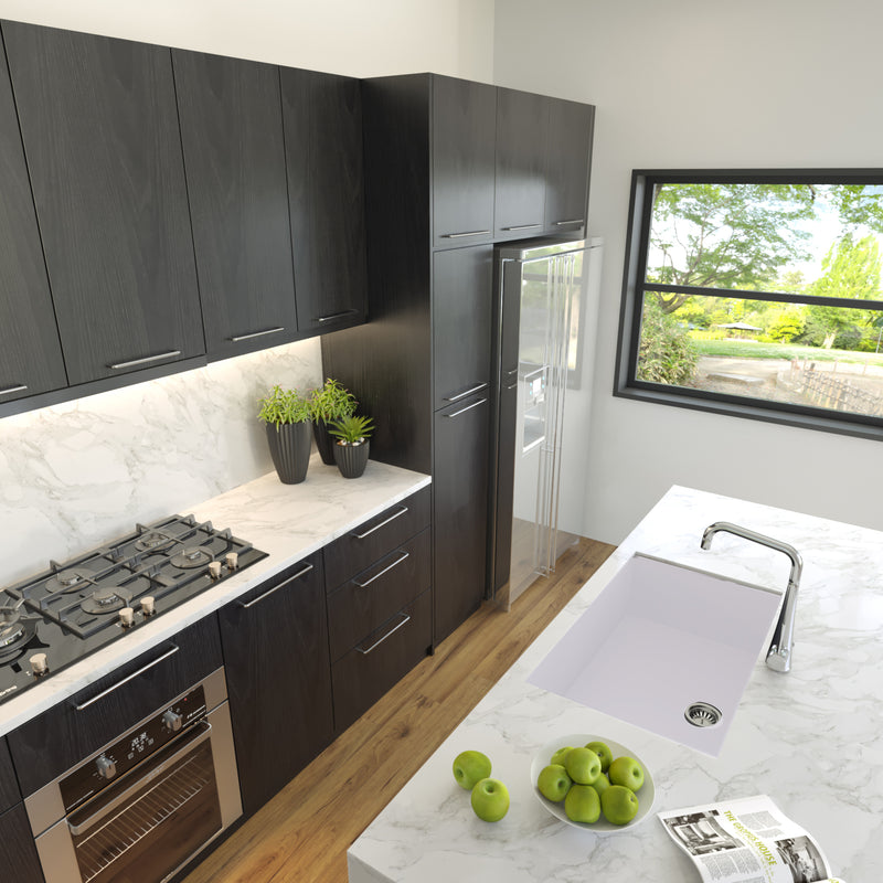 Nantucket Sinks PR3018-W white single-bowl sink undermounted in a marble kitchen island
