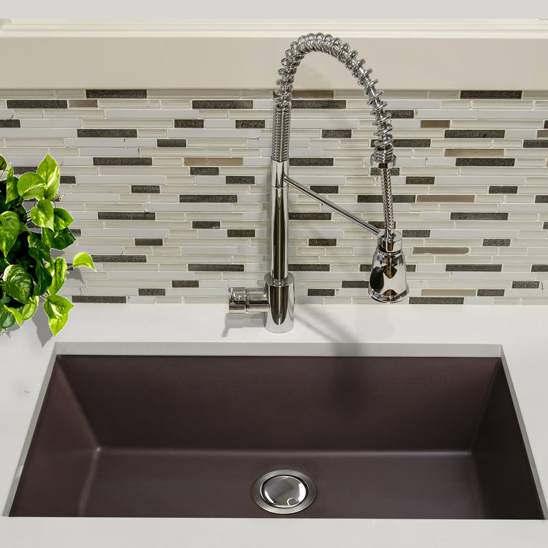 Nantucket Sinks PR3320-BR-UM brown sink undermounted in a white counter with a spring pull-down faucet
