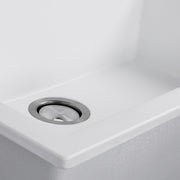 Nantucket Sinks PR3322-DM-W close-up of the stainless drain and white granite bowl floor