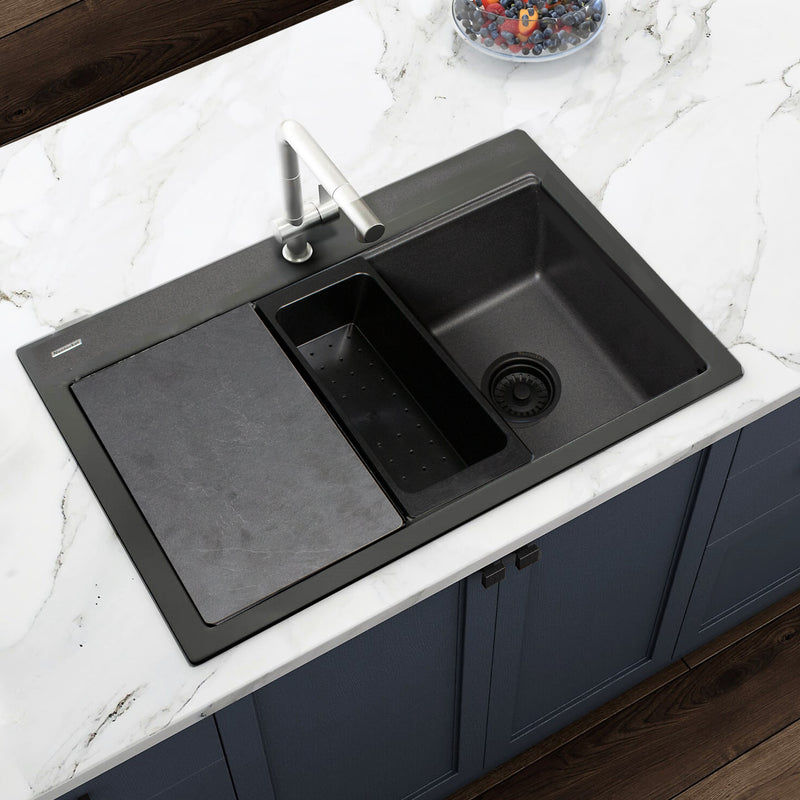 Nantucket Sinks PR3322PS-BL black workstation sink drop-in mounted in a marble counter with board and colander