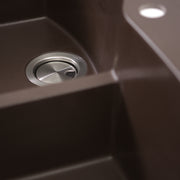 Nantucket Sinks PR6040-BR close-up of the stainless drain and low divide in the brown granite bowl