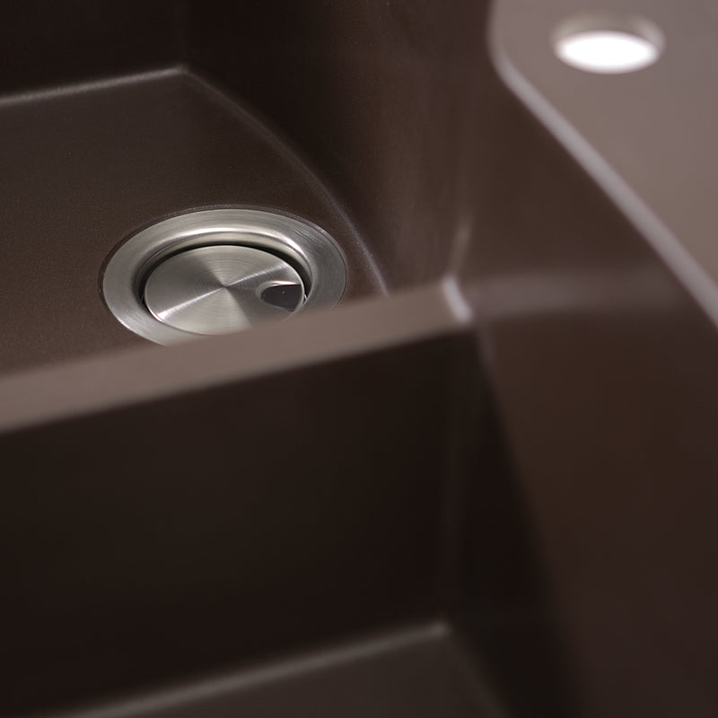Nantucket Sinks PR6040-BR close-up of the stainless drain and low divide in the brown granite bowl