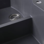Nantucket Sinks PR6040-TI close-up of the stainless drain and low divide in the titanium granite bowl