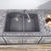 Nantucket Sinks PR6040-TI titanium double bowl sink drop-in mounted in a granite counter with a gooseneck faucet