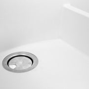 Nantucket Sinks PR6040-W-UM close-up of the stainless drain in the white granite bowl